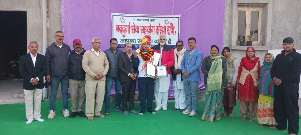 World record by Bijender Singh Pulling a School Bus with Teeth for a Powerful Social Message in Bhiwani, Haryana. Ace Book Of Records.