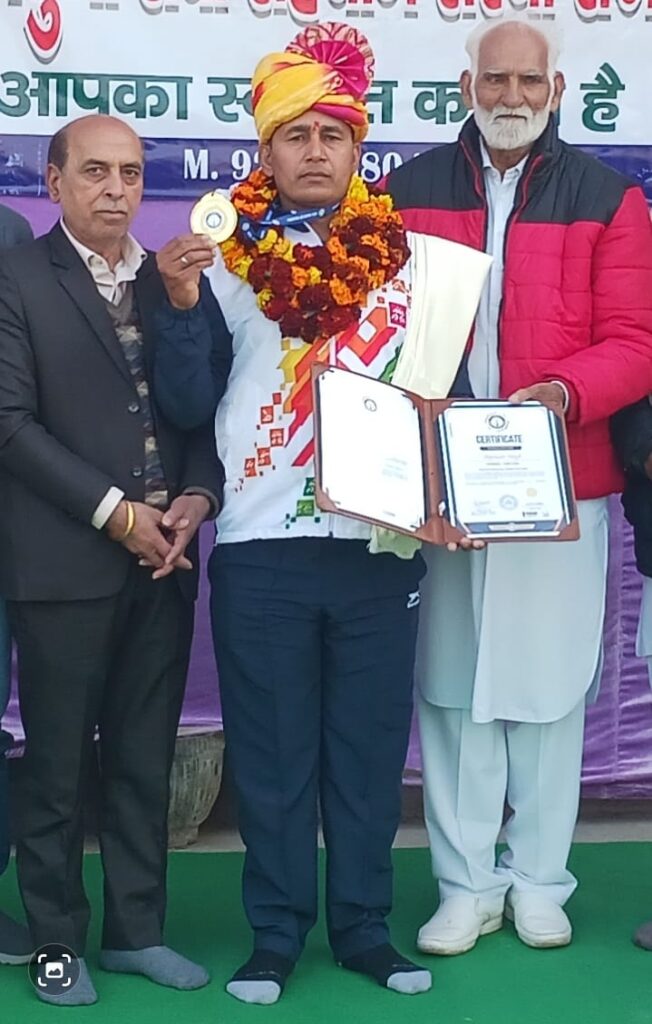 World record by Bijender Singh Pulling a School Bus with Teeth for a Powerful Social Message in Bhiwani, Haryana. Ace Book Of Records.