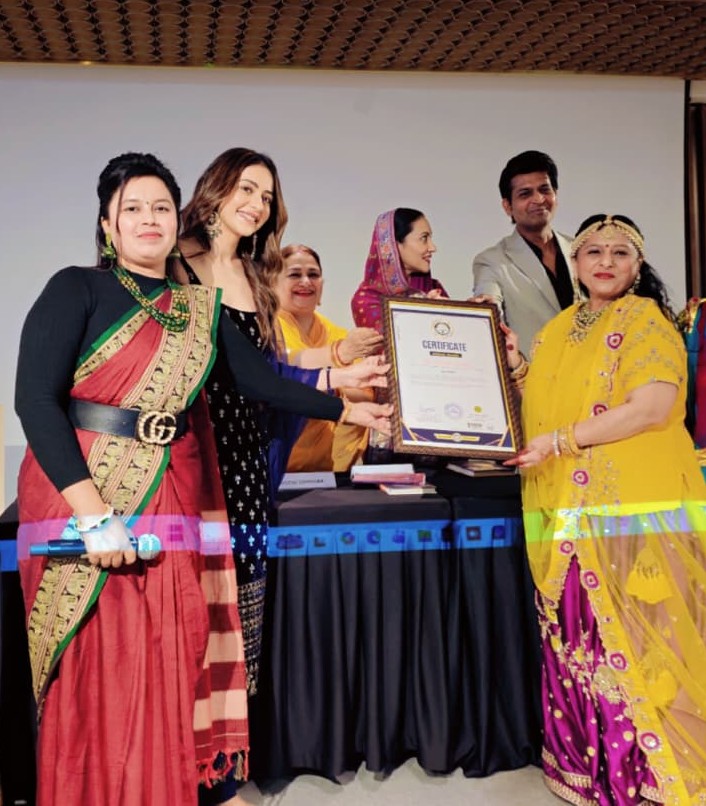 Discover how Dr. Manju Lodha created a unique record by writing 500 poems with passion and dedication, recognized by Ace Book of Records.
Rakul Preet Singh graced the record certificate
